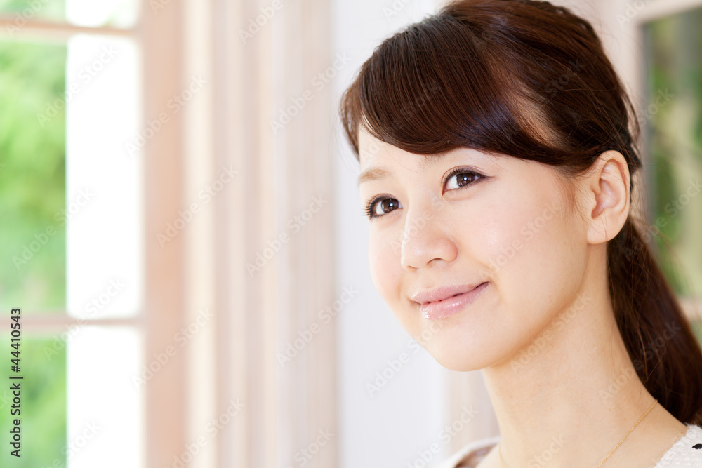 Beautiful young woman relaxing in the room. Portrait of asian. Beautiful young woman relaxing in the room. Portrait of asian.