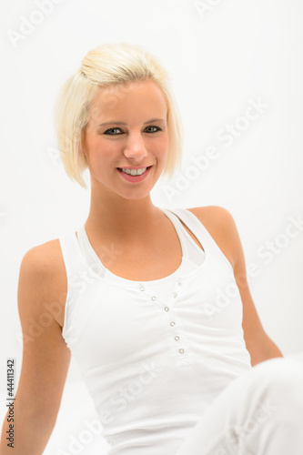 Sport blond fitness woman on white background
