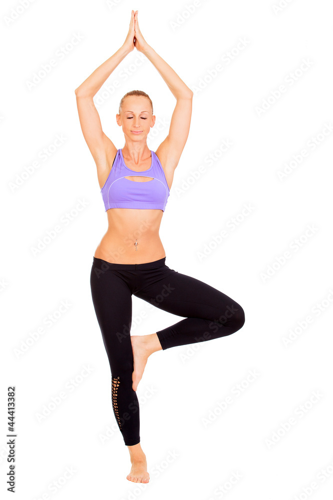 full-length portrait of woman working yoga exercise tree-pose