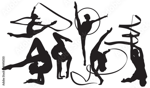 Silhouettes of gymnasts