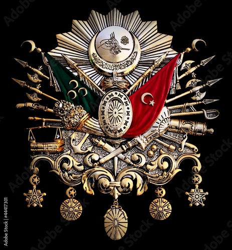 Turkish old Ottoman Empire emblem on black background. photo