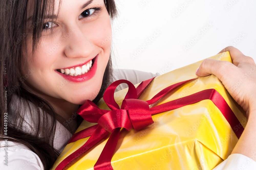 Young woman with christmas present Young woman with christmas present