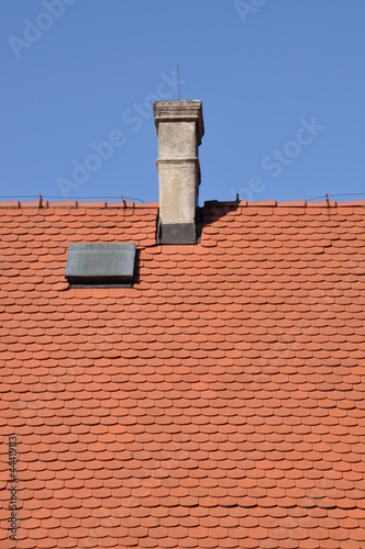 Traditional tile, red roof and blue sky