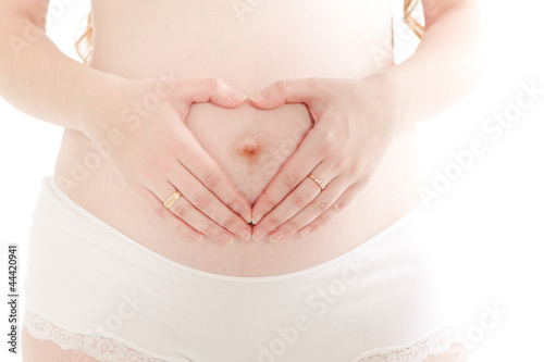 Wallpaper Mural pregnant woman holding her tummy Torontodigital.ca