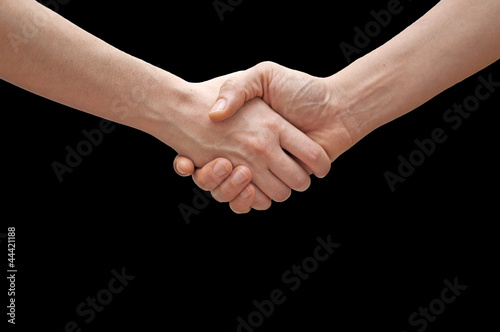 People handshake isolated on black background
