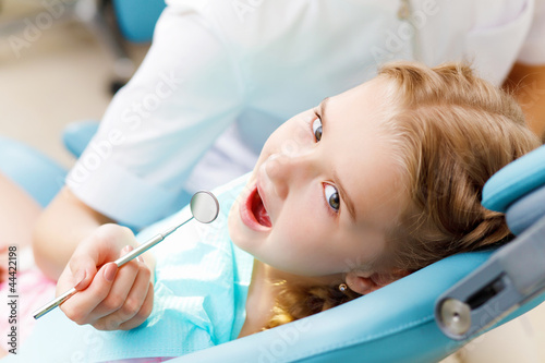 Little girl visiting dentist