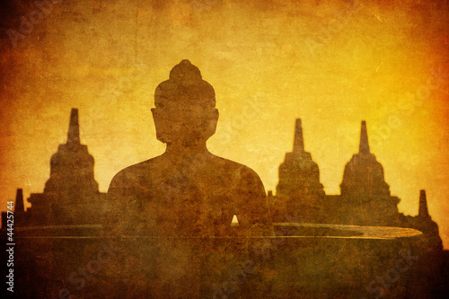 Vintage image of Buddha statue at Borobudur temple, Java, Indone