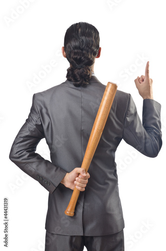 Angry businessman with bat on white