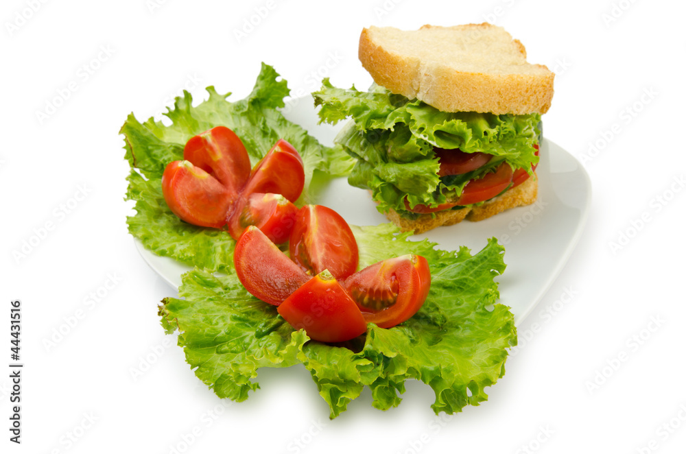 Tomatoes and cucumbers on white Tomatoes and cucumbers on white