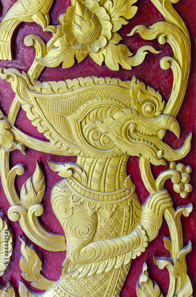 Fototapeta premium Thai stye carving texture in temples wall