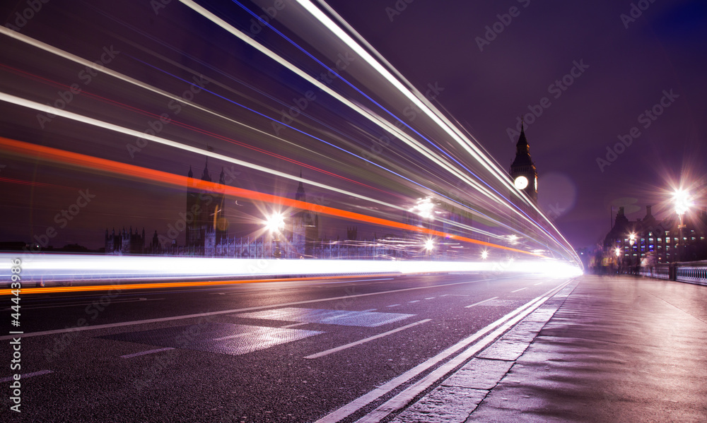 Traffic over the Westminster Bridge blurred by long exposure Traffic over the Westminster Bridge blurred by long exposure