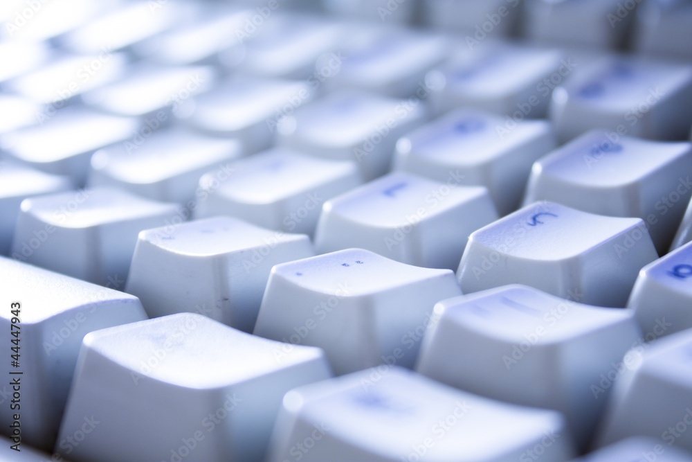 keyboard blue toned with shallow depth of field keyboard blue toned with shallow depth of field