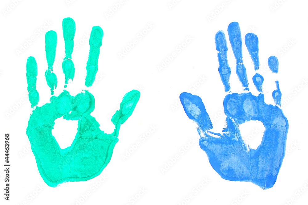 bright blue and green handprints on white background close-up bright blue and green handprints on white background close-up
