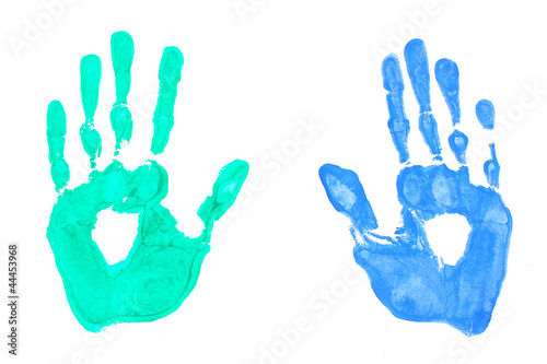 bright blue and green handprints on white background close-up