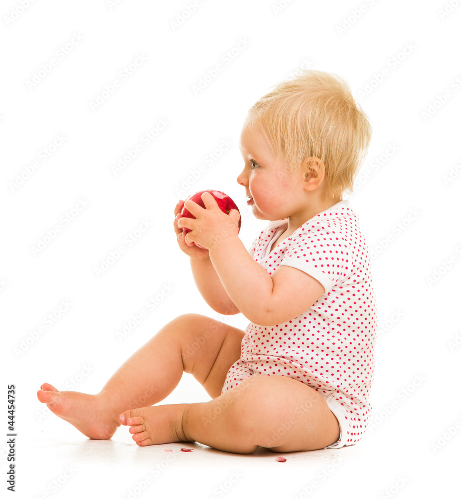 Cute infant girl learining to eat with spoon Cute infant girl learining to eat with spoon