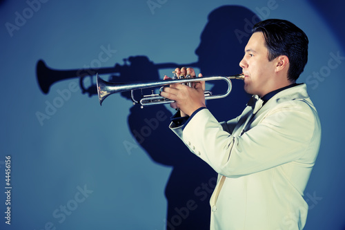 blowing trumpet