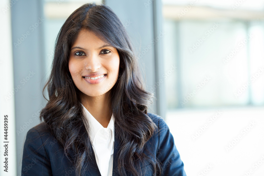 beautiful young indian businesswoman portrait in office