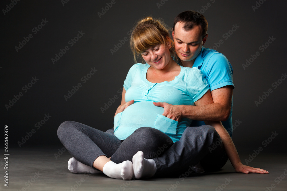 Portrait of happy young family together waiting for baby Portrait of happy young family together waiting for baby