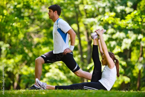 Couple doing stretching exercise  after jogging © .shock