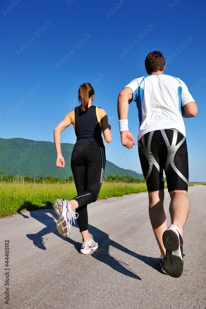 Obraz premium Young couple jogging