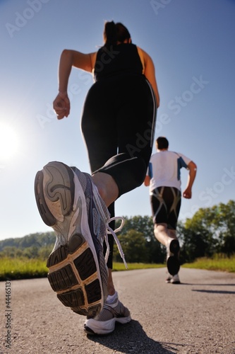 Fototapeta Naklejka Na Ścianę i Meble -  Young couple jogging