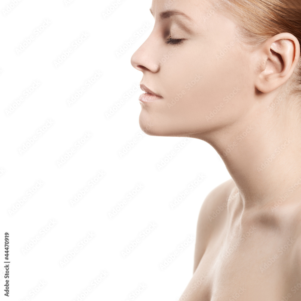 Beautiful woman's face with clean skin - isolated on white Beautiful woman's face with clean skin - isolated on white