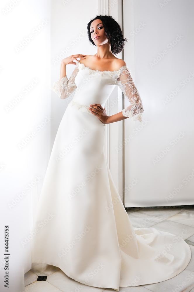 Young black woman, model of fashion, with wedding dress