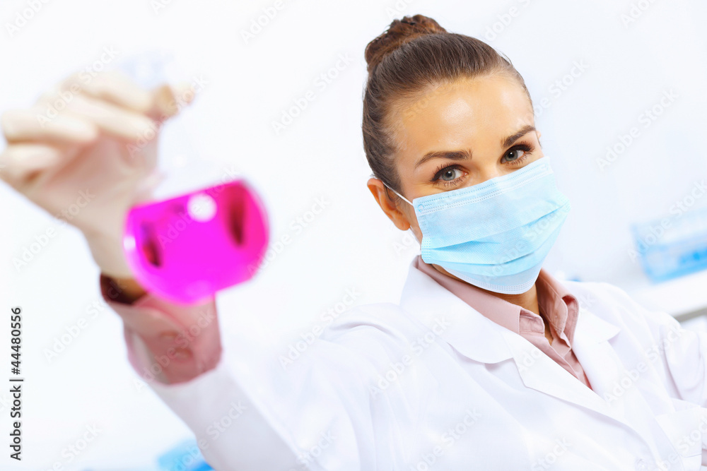 Young female scientist working in laboratory