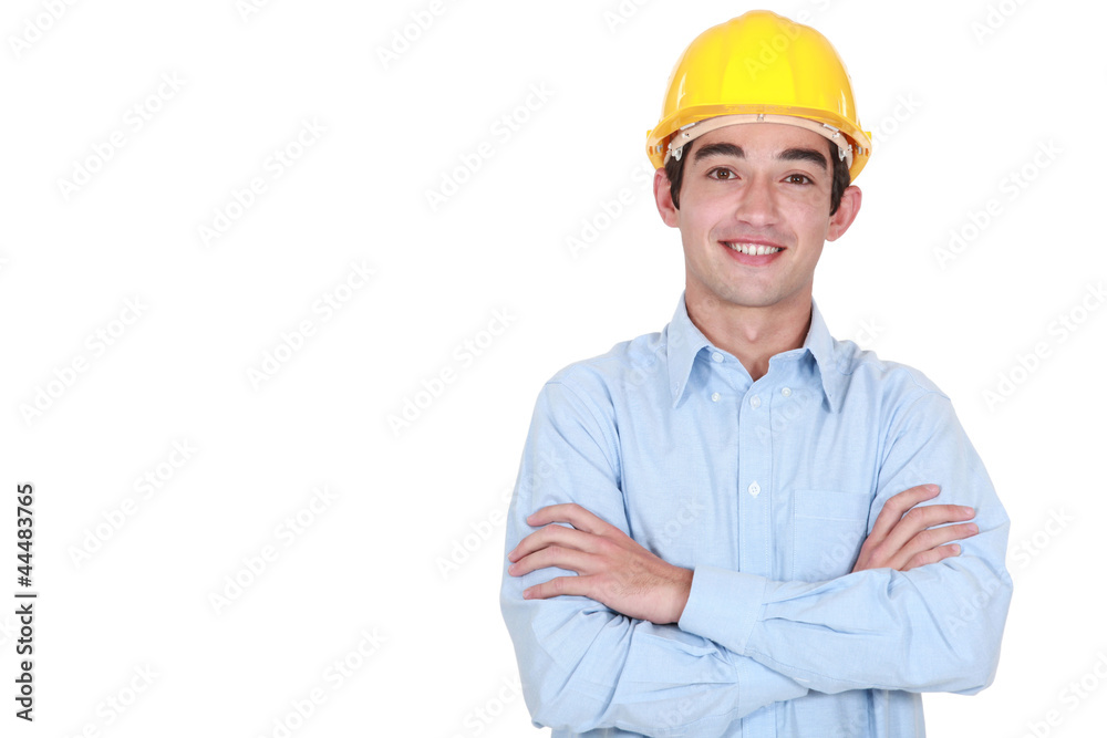 portrait of young foreman all smiles isolated on white