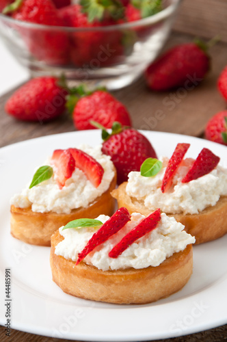 Cottage cheese cream toast with a slices of strawberry 