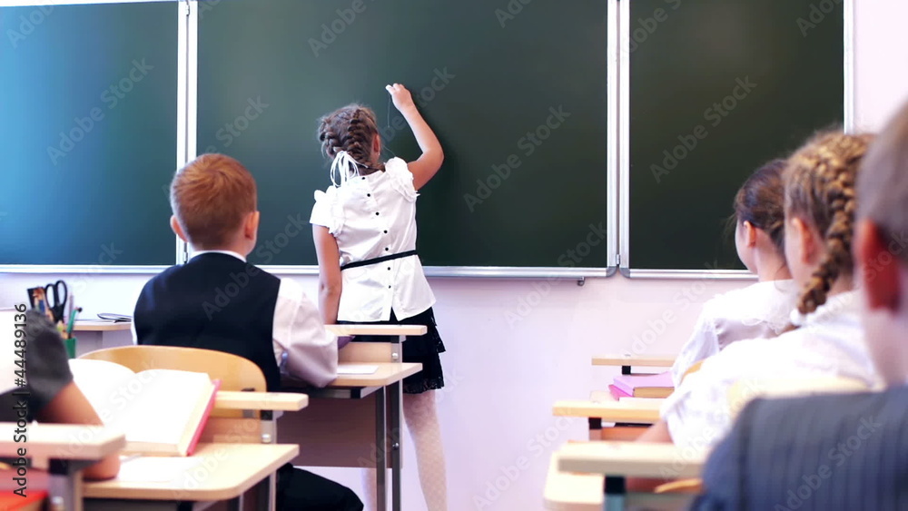 school girl giving answer – writing text back to school school girl giving answer – writing text back to school