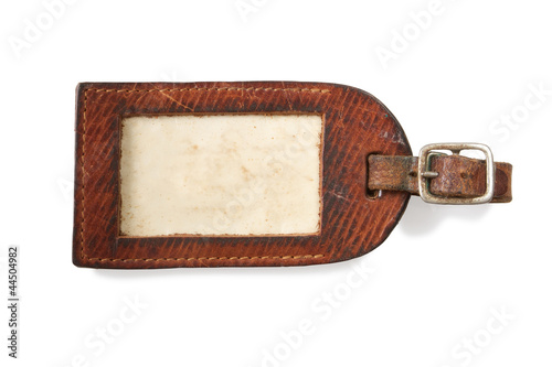leather luggage tag isolated on white