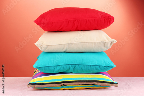 pillows on red background