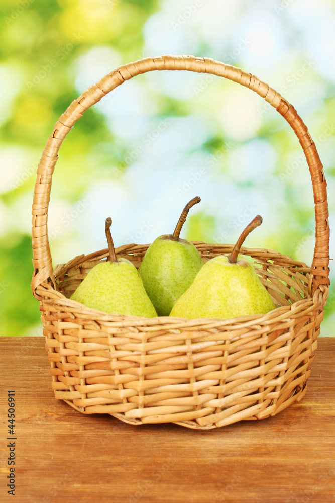 Ripe pears on colorful green background Ripe pears on colorful green background
