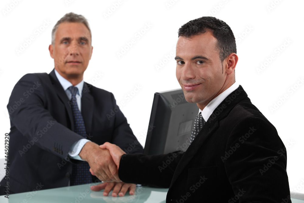businessmen shaking hands businessmen shaking hands
