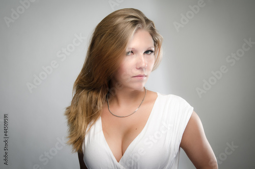 Beautiful blonde girl in studio