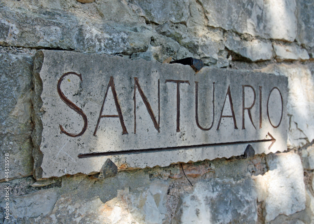 Sign with arrow and written Sanctuary of St. Francis Sign with arrow and written Sanctuary of St. Francis