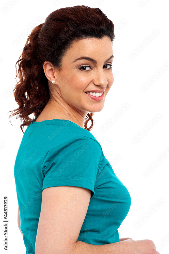 Adorable young pretty woman turning back Adorable young pretty woman turning back