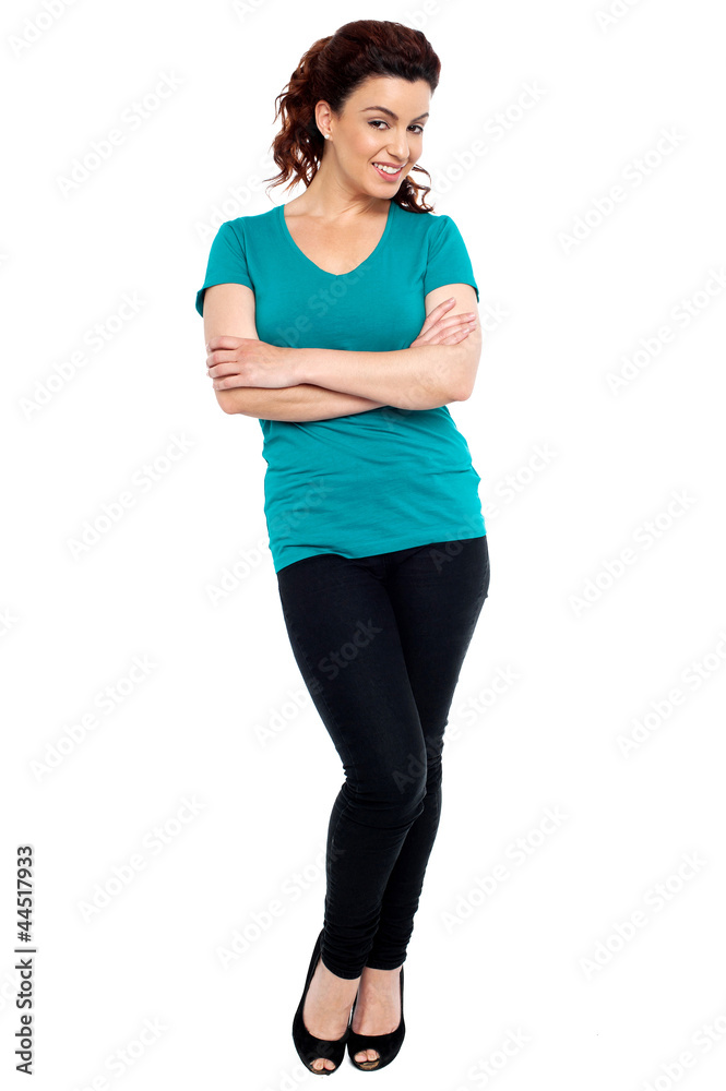 Cheerful woman posing with her hands crossed Cheerful woman posing with her hands crossed