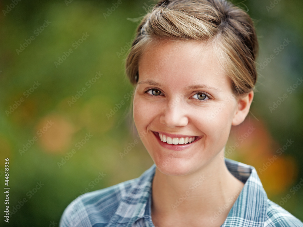 lovely young woman, portrait in the garden lovely young woman, portrait in the garden