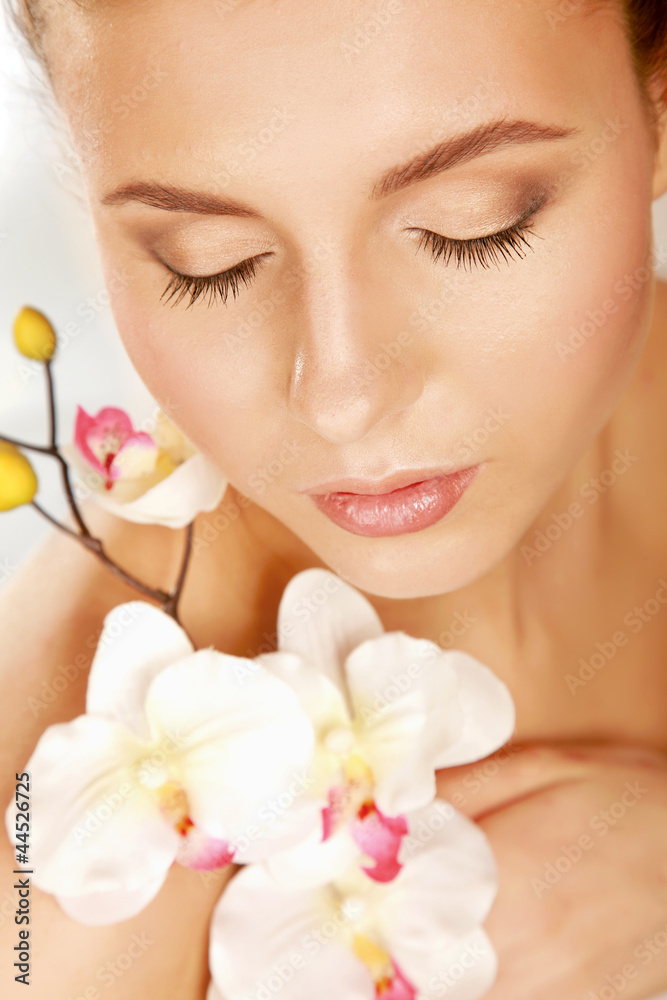 A pretty young woman with a flower A pretty young woman with a flower
