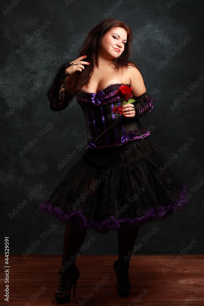 Pretty young witch preparing for halloween Pretty young witch preparing for halloween