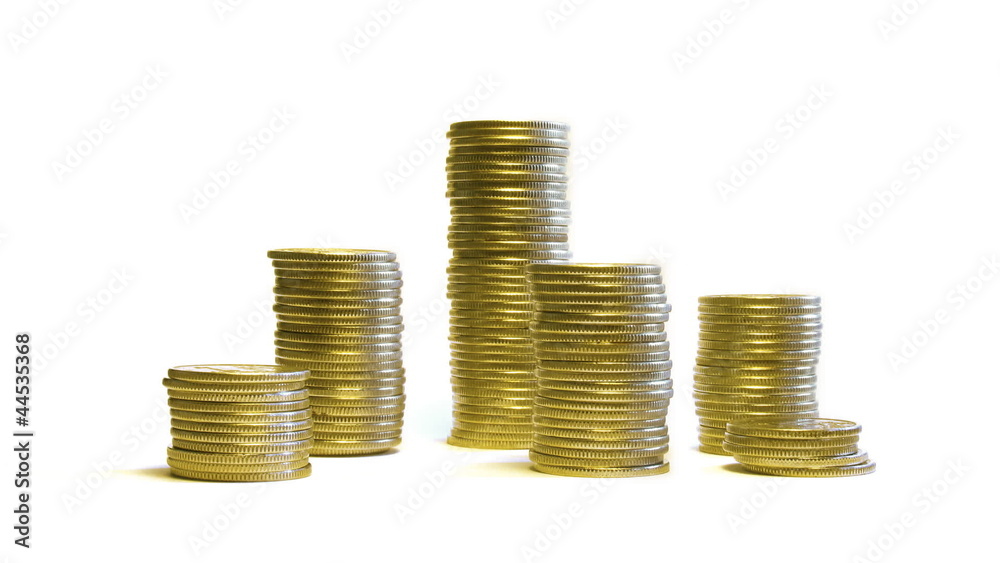 growing and reducing stacks of coins isolated on white growing and reducing stacks of coins isolated on white