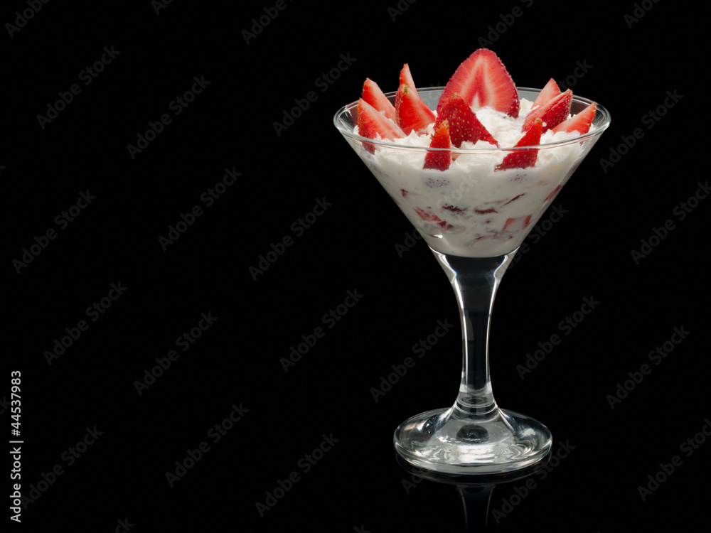 Strawberry with cream in a glass. Strawberry with cream in a glass.
