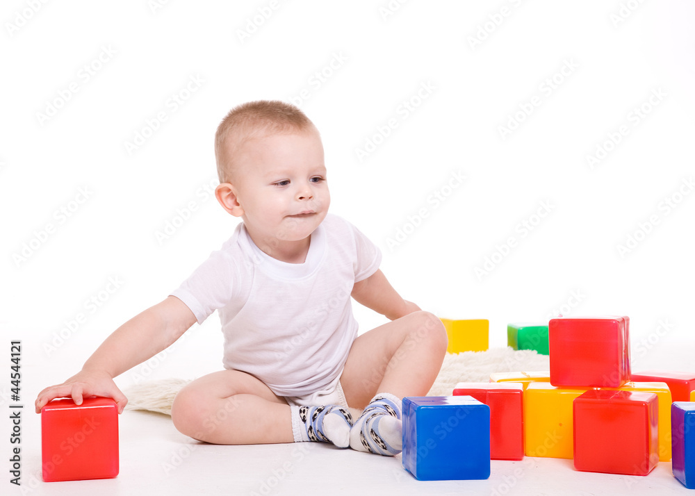 Baby boy plays with toy blocks Baby boy plays with toy blocks