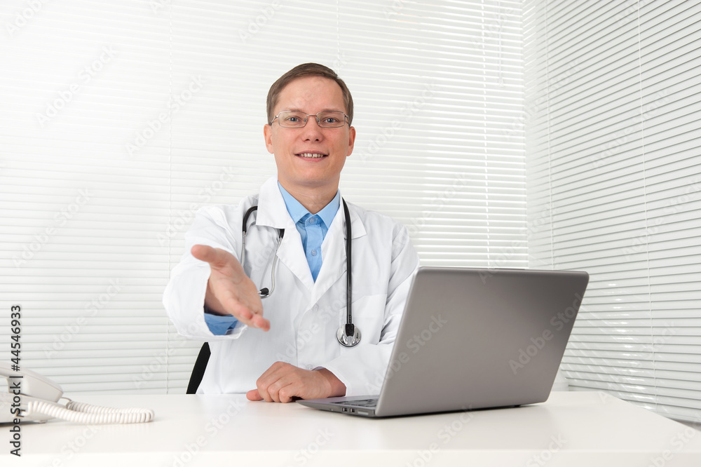 Caucasian doctor with a computer Caucasian doctor with a computer