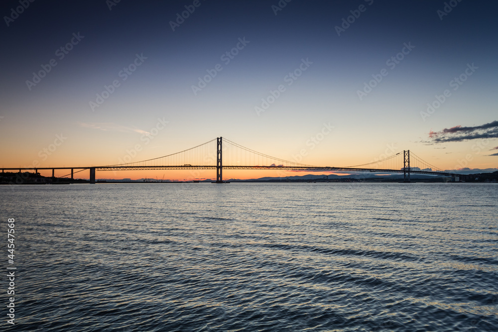 Sunset over river and bridges in Queensferry Sunset over river and bridges in Queensferry
