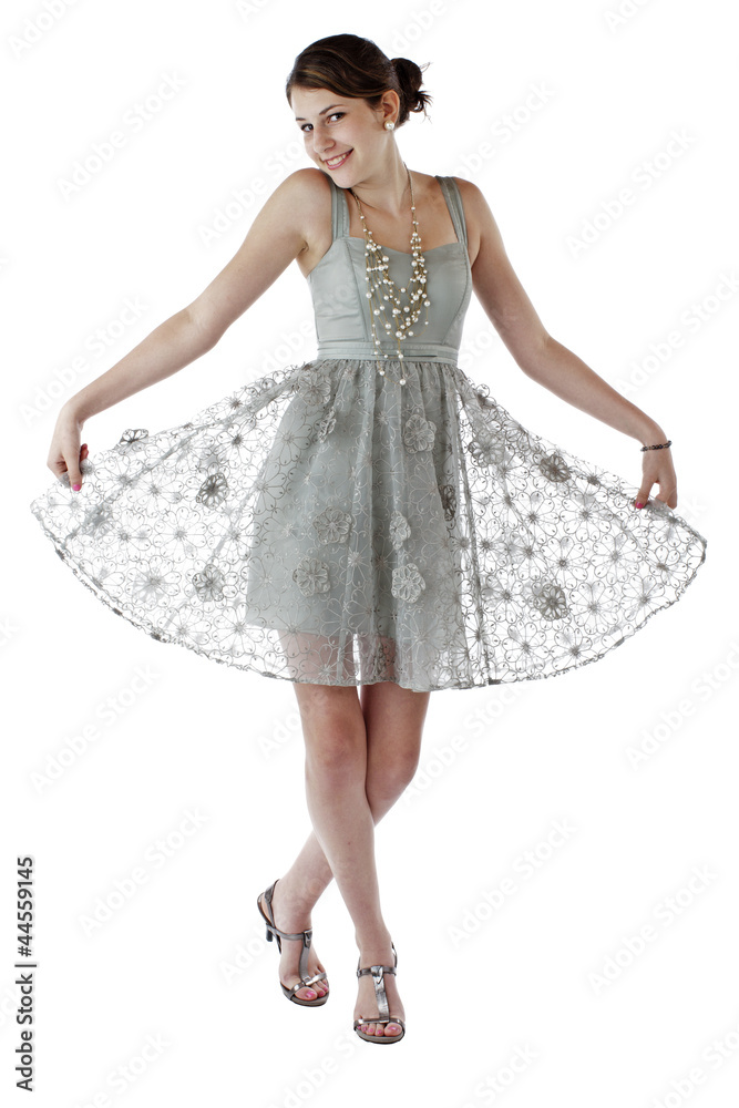 Naklejka premium Teenage girl dances in lace party dress