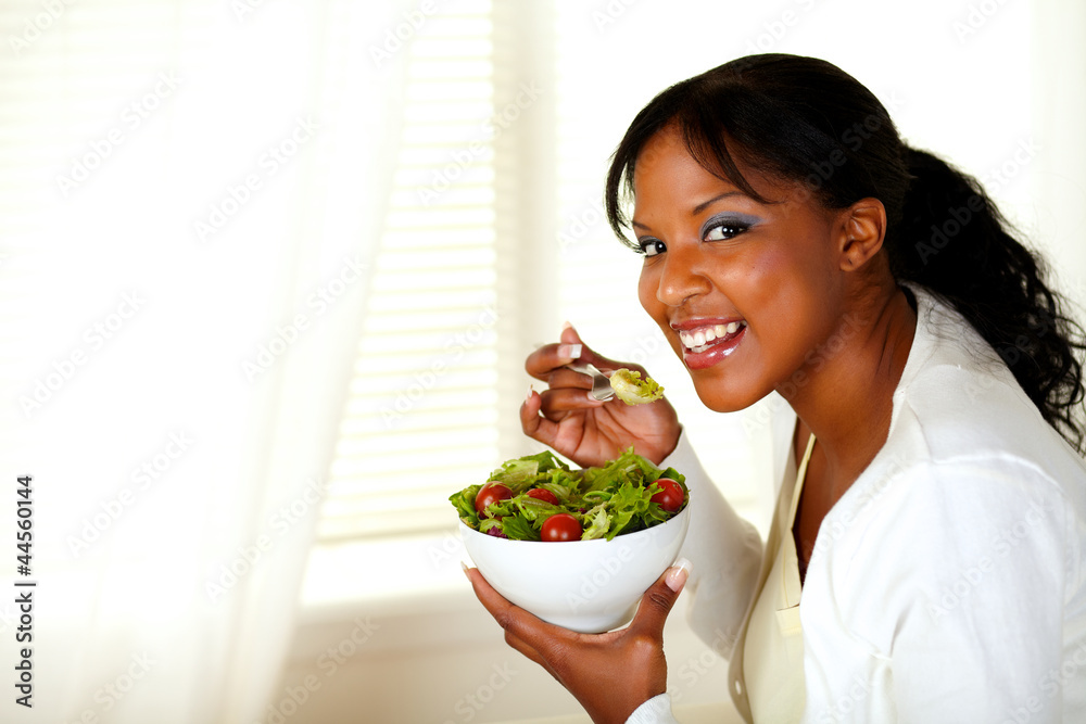Beautiful girl eating vegetable salad Beautiful girl eating vegetable salad