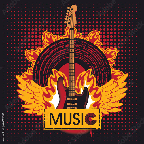 electric guitar against the vinyl disc on fire